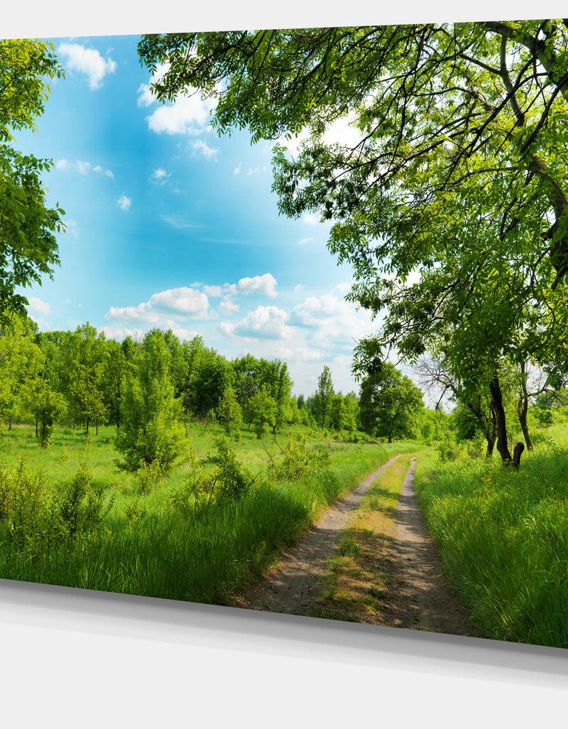 DesignQ Green Forest Road And Blue Sky - Modern Landscape Canvas Art