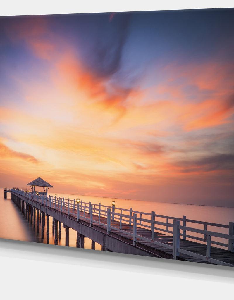 DesignQ Infinite Wooden Bridge Under Clouds - Sea Bridge Canvas Wall Artwork