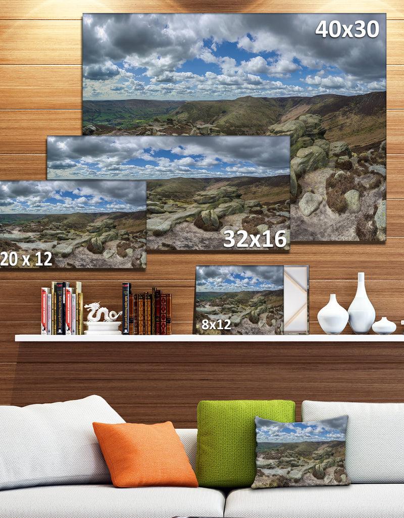 DesignQ Clouds And Stones Under Wild Clouds - Landscape Artwork Canvas