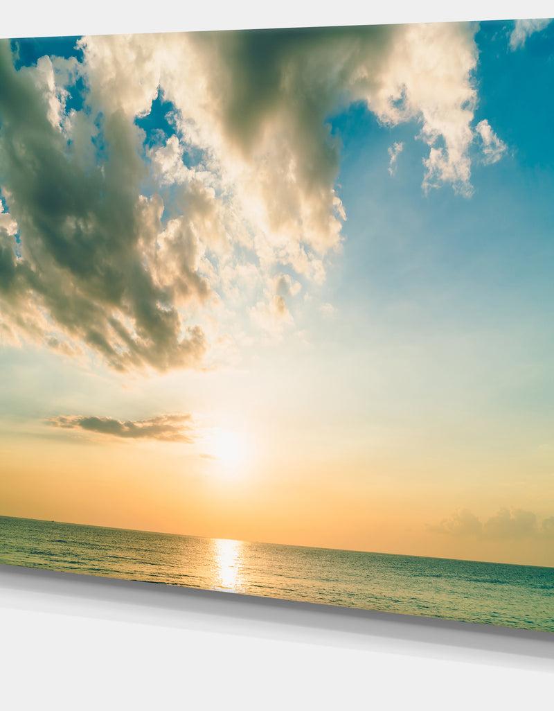 DesignQ Clouds Together Over Blue Seashore - Seashore Canvas Wall Art