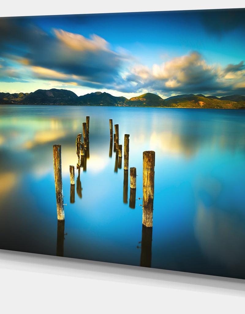 DesignQ Cloudy Lake With Broken Pier - Seascape Photo Canvas Print