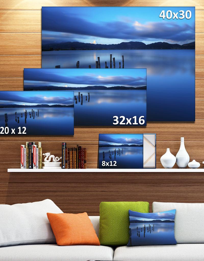 DesignQ Dark Blue Sea With Pier Remains - Seascape Photo Canvas Print