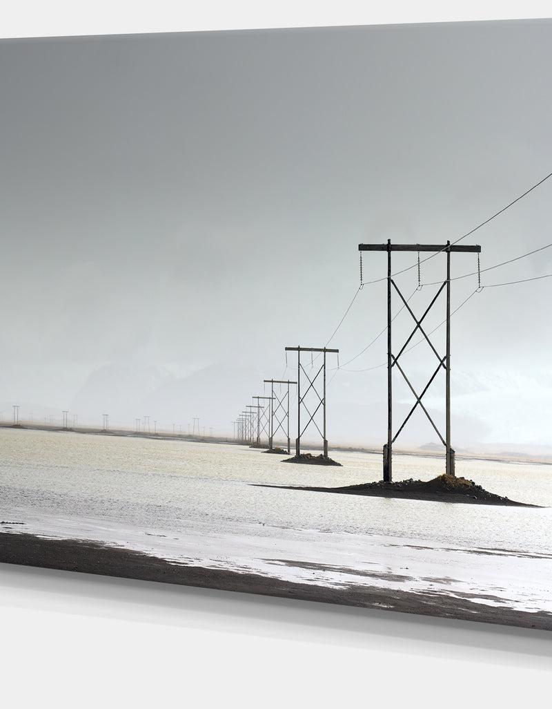 DesignQ Electricity Pylons Over Lagoon - Landscape Canvas Wall Artwork