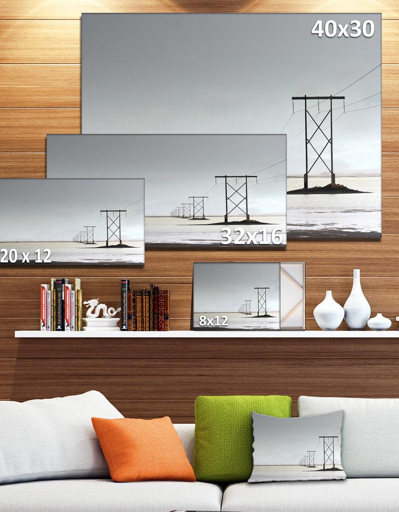 DesignQ Electricity Pylons Over Lagoon - Landscape Canvas Wall Artwork