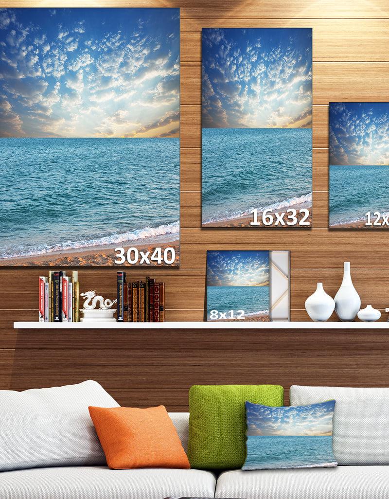 DesignQ Fasting Moving Clouds Over Blue Beach - Modern Beach Canvas Art Print