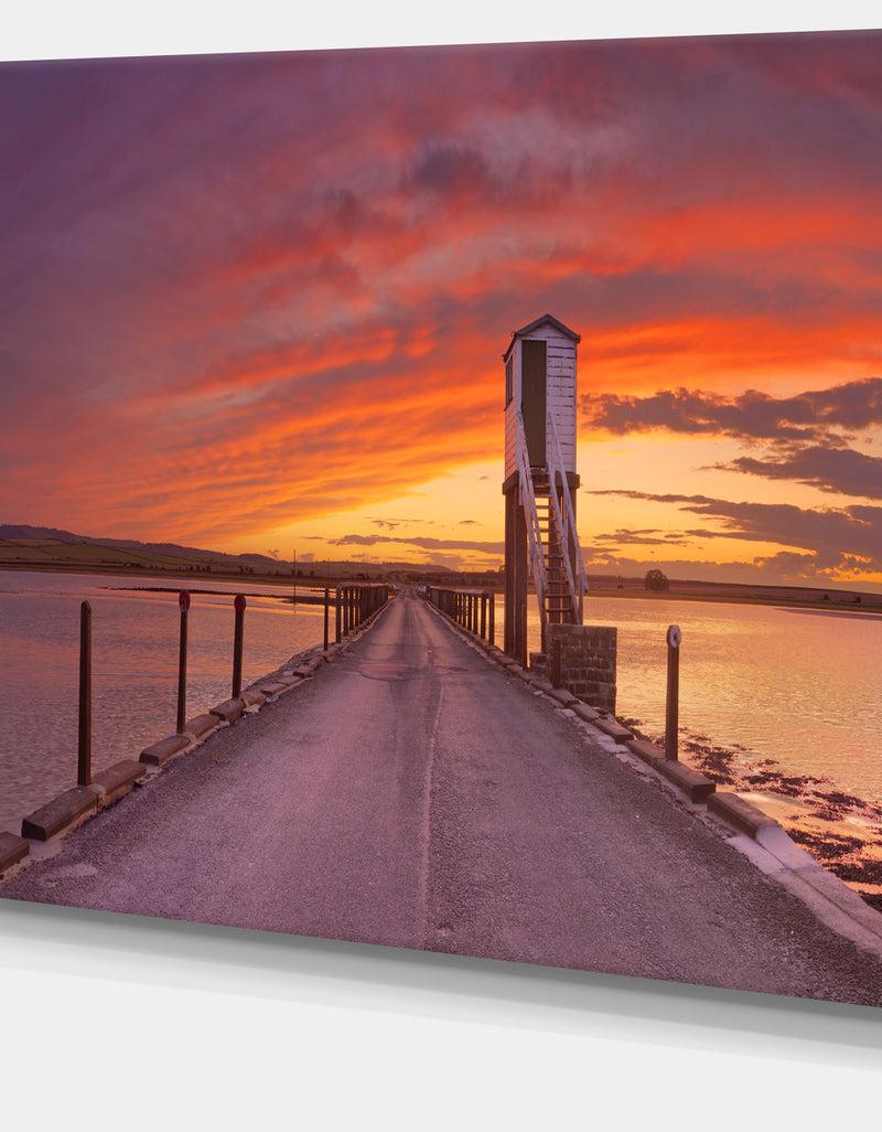 DesignQ Holy Island Of Lindisfarne Panorama - Wooden Sea Bridge Canvas Wall Art
