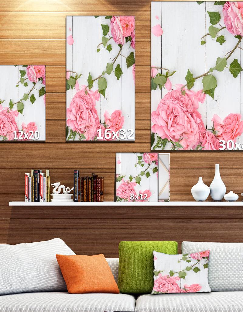 DesignQ Pink Roses Facing Lying On Wood - Floral Photography On Wrapped Canvas