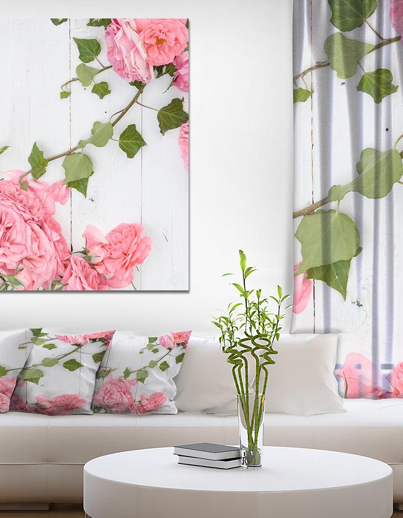 DesignQ Pink Roses Facing Lying on Wood - Floral photography on Wrapped Canvas
