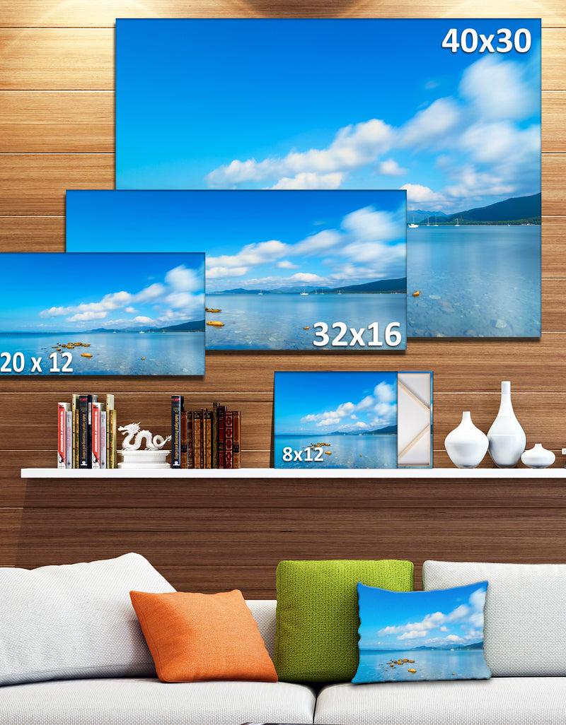 DesignQ Rocks In A Blue Panoramic Sea Bay - Extra Large Seashore Canvas Art