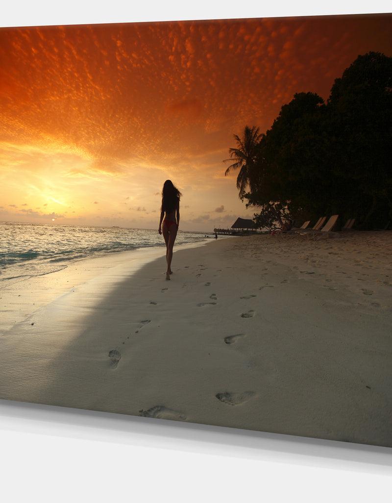 DesignQ Woman Walking On Beach - Seashore Photo Canvas Art Print