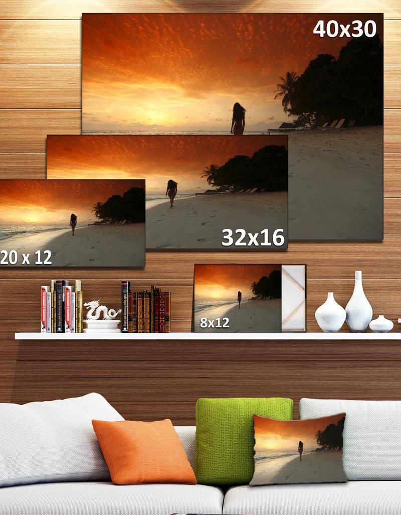 DesignQ Woman Walking On Beach - Seashore Photo Canvas Art Print