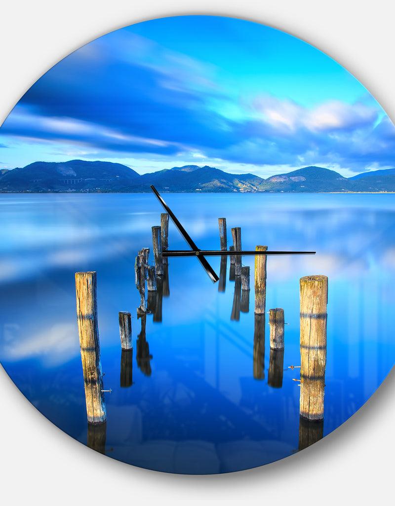 DesignQ Wooden Pier Remains In Blue Sea - Large Coastal Wall CLock
