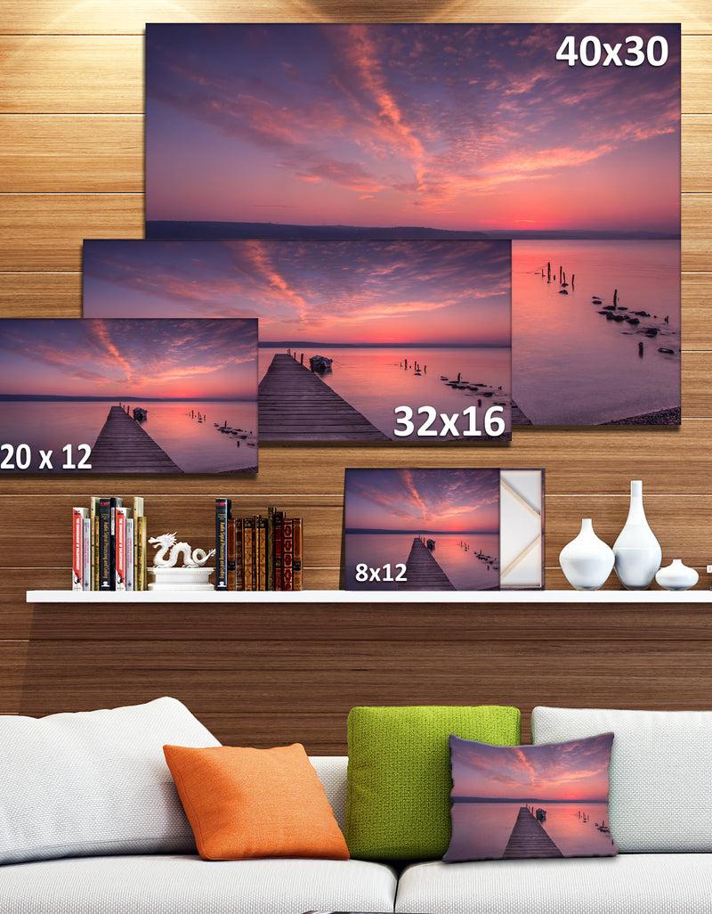 DesignQ Wooden Pier Under Red Sky - Seascape Photo Canvas Print